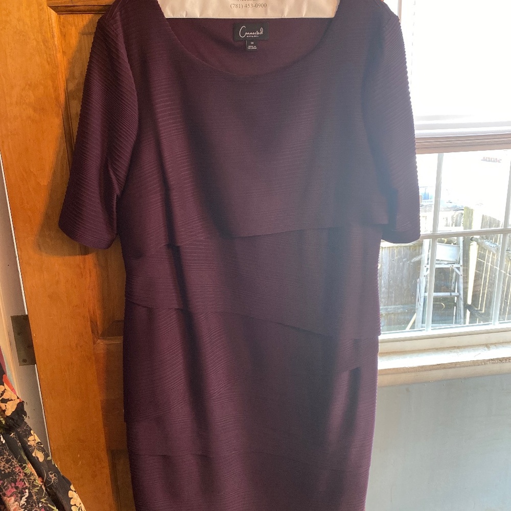 Dress size 14. Just dry cleaned. Like new!
